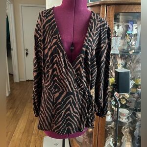 Animal Print With Sleeves. VNeckline